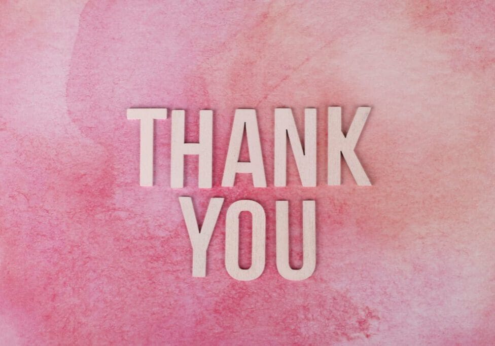 A pink background with the words " thank you ".